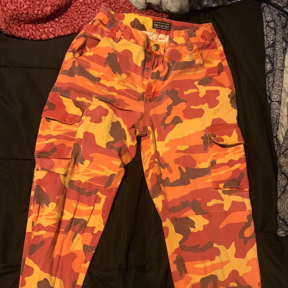 Orange camouflage cargo pants.